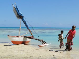 Children with their on mini-canoe at Ailuk Atoll. Photo: Karen Earnshaw